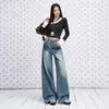 Jeans de tiro alto con contraste de línea roja, lavados vintage en azul, desgastados, transfronterizos, para mujer, moda casual nueva de principios de otoño 2026