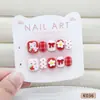 Gato de dibujos animados suave y lindo con lazo, lunares y flores, uñas postizas dulces y juguetonas para niños, uñas ponibles