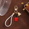 Nuevo Regalo de San Valentín Llavero Colgante Corazón Sensación de Alta Gama Cadena para Teléfono Encanto de Bolso Corazón Accesorio Creativo