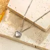 Brincos adoráveis estilo coreano estilo frio feminino círculo pequeno feminino aço titânio dourado não desbota Conjunto de brincos de colar círculo