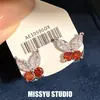 ¡Brillando intensamente! Pendientes de mariposa con circonita de aguja plateada, pendientes de lujo ligero para el día a día, estilo simple y versátil, pendientes de moda al por mayor