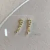 Acessórios para Unhas em Formato de Estrela Mais Vendidos, Luxo Leve Zircônia Brilhante Estrela de Quatro Pontas Cobre Incrustado Zircônia Decorações 3D para Unhas Venda por Atacado