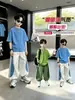 Conjunto de Jazz de Verano Elegante para Niños 2026 Modelo Nuevo Camiseta Transpirable de Moda para Niños Pantalones Casuales Danza Urbana