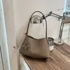 Bolso para Axila de Mujer 2026 Nueva Moda Verano Nicho Alto Gama Patrón Tejido Bolso de Hombro Bolso de Mano para Viajes