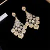 Brincos de prata estilo francês com pingentes de gota d'água cravejados de diamantes e em formato de diamante, brincos de estilo court vintage com design único, brincos de nicho