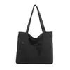Bolso de lona lavado estilo japonés transfronterizo nuevo, gran capacidad, diseño simple, adecuado para ir al trabajo y se puede usar como bolsa de compras para estudiantes