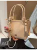 Transfronterizo Primavera 2025 Nuevo Estilo Coreano Casual Nicho Repujado Portátil Bolso de Cubo Bolso Bandolera para Compras y Desplazamientos para Niñas