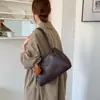Bolso de mano simple de alta costura estilo coreano, bolso tipo cubo de nicho para el día a día, nuevo modelo 2026, bolso de hombro y axila elegante y versátil