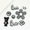 Charms para Sapato Crocs Desenho Animado Raio Grafite Urso Preto Acessórios Acessórios para Chinelo DIY Charms de Sapato Removíveis Atacado do Fabricante