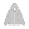 Sudadera con capucha informal a rayas estilo americano para hombre, adecuada para primavera y otoño, con corte holgado, cierre de cremallera y un diseño retro japonés