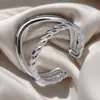 Moda Europea y Americana Nuevo Anillo Geométrico Hueco de Acero Inoxidable Apertura Ajustable Nicho de Alto Grado Anillo de Acero de Titanio para Mujeres