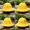 En stock gorro amarillo pequeño Escuela Primaria jardín de infancia gorro de pescador para niños con LOGO estampado gorro para el sol