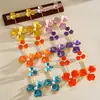 Pendientes de botón de acero con flor de gota de aceite de perla transfronterizos europeos y americanos, pendientes exagerados simples y dulces, pendientes para mujer de lujo ligero y de alta gama