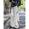Pantalones largos de marca de moda estilo americano de corte holgado, pantalones deportivos casuales de pierna ancha, pantalones de chándal a rayas de alta resistencia para hombre, diseño deconstruido de otoño