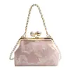 Bolso de Mano de Alta Gama con Textura Estilo Chino Nuevo 2026 Nueva Moda Versátil Bolso Cruzado de Hombro Mariposa