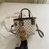 Bolsa balde simples, única e estilosa, estilo coreano, moderna e casual, novo modelo outono 2026, bolsa feminina de ombro e transversal com textura