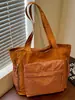 Bolsa de mano Shuai Mi Jia de gran capacidad 2026 nueva de moda bolso de mano simple moda femenina bolso de hombro casual