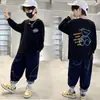 Camiseta de manga larga lisa de algodón puro para niño, camiseta básica para primavera y otoño, nueva prenda superior estampada estilo coreano, elegante y versátil para niños