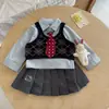 Conjunto Estilo Academia para Meninas 2026 Outono Colete de Tricô Infantil Camisa com Gravata Top Saia Plissada Tendência
