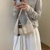 Versátil textura tejida nueva 2026 para mujer, exquisita bolsa diagonal retro para debajo del brazo, bolso de mano texturizado, bolso de hombro único para el commuting de otoño