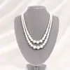 Collar de perlas de vidrio estilo cheongsam multicapa, nuevo estilo retro, cadena de clavícula, cadena de lana de doble capa, cadena de cuello de vidrio de tres capas