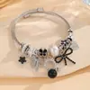 Pulseira de Miçangas DIY Estilo Luxo Leve Preto e Branco Múltiplos Pingentes Corrente Osso de Cobra Moda Transfronteiriça Europeia e Americana Pulseira Acessórios Femininos Atacado