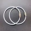 Em estoque Chaveiro de anel de cabo de aço Anel de aço inoxidável com revestimento de borracha colorida Fivela de trava de cabo de aço com revestimento de plástico Grande quantidade negociável E18