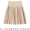 Saia de cashmere para mulheres, outono e inverno, nova saia curta plissada bufante de cintura alta com cordão estilo balé, elegante