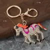 Llavero de Caballo Corriendo de Diamantes Completos Nuevo Creativo Transfronterizo 2026 Caballo del Zodiaco Colgante de Mochila de Moda Tendencia Venta al por Mayor