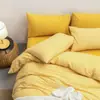 Juego de cuatro piezas de algodón 100% teñido en hilo y lavado, algodón puro, sin marca, suministrado por el fabricante, funda de edredón de alta calidad, sábana bajera de estilo japonés, ropa de cama al por mayor