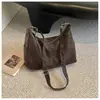 Bolso grande de mujer de nuevo diseño para principios de otoño 2026, bolso de hombro cruzado de color liso a la moda, bolso informal tipo albóndiga para el día a día