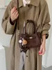 Bolso modelo nuevo 2026 transfronterizo, bolso de mano simple estilo coreano, bolso tipo cubo de moda de gran capacidad, bolso cruzado casual para el día a día