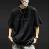 2026 Verano Delgado Estilo Americano Casual Top para Hombre Cuello Redondo Estampado de Letras Manga Corta Camiseta Moderna Versátil Camisa de Media Manga