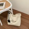 Bolso de lona casual de gran capacidad para mujer, nuevo 2026, bolso de hombro ligero y simple para el día a día, bolso cruzado, bolso de mano, bolso tipo cubo