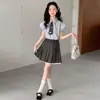 Conjunto de Camisa con Mangas Volantes y Falda Corta de Nuevo Estilo de Verano para Niñas, Ropa Infantil, Conjunto de Dos Piezas Vestido Estilo Academia para Niñas