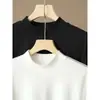 Camiseta de manga larga de algodón pesado de moda estilo Hong Kong con cuello semi-alto para mujer, casual y elegante, estiliza y versátil, adecuada tanto para llevar sola como debajo de otra prenda.