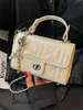 Elegante y sencillo bolso Kelly estilo francés para mujer, nuevo bolso versátil 2026 para hombro y cruzado, adecuado para ir al trabajo y uso casual, moderno bolso pequeño cuadrado