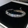 Pulseira Redonda Europeia e Americana Transfronteiriça com Borla e Cravejada de Diamantes, Pulseira Minimalista Moderna de Estilo Nicho com Design Único, Joia de Mão de Nicho