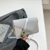 Bolso Cruzado Ins de Aspecto Elegante y Versátil para Mujer 2025 Nuevo Diseño de Moda con Cerradura de Bloqueo Diseño Geométrico Bolso Cuadrado Pequeño