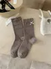 Calcetines de otoño para mujer con bordes rizados y lazos, calcetines de algodón puro de color café para mujer hasta la pantorrilla, calcetines sin costuras al por mayor