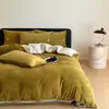 Juego de ropa de cama de cuatro piezas de terciopelo de leche de color sólido minimalista de grado A, engrosado para el calor del invierno, funda de edredón y sábana bajera de forro polar coral, disponible para compra grupal como regalo