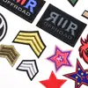 Elegante bordado Insignia negra Pegatina bordada Estrella de cinco puntas Decoración de tres polos Bordado