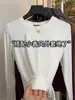 Camiseta Básica Versátil de Manga Larga Acanalada de Color Sólido con Cuello Redondo, Estilo Minimalista, Casual, para Mujer, Primavera 2026, Top Interior Ajustado