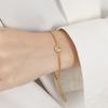 Collar de azúcar de nicho ins de lujo ligero de alta gama estilo coreano, pulsera, aretes, traje de joyería de acero de titanio de moda