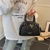 2026 Moda Estilo Coreano Diseño de Nicho Bolso Bolso de Bowling para Mujer Verano Nuevo Casual Retro Bolso de Hombro Cruzado