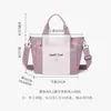 Bolsa de Tecido de Nylon Transfronteiriça Nova Bolsa de Mão Feminina Multifuncional Portátil Grande Capacidade Versátil Casual Bolsa de Ombro Atacado
