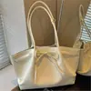 Bolso de mano de nicho de alta gama coreano, bolso tote de gran capacidad, lazo de moda, bolso dulce para el hombro