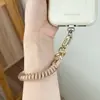 Cordón retráctil de silicona para teléfono, llavero corto de bobina para teléfono, cadena para teléfono, correa de muñeca, sensación de alta gama