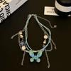 Collar de mariposa azul degradado estilo milenio, collar con diseño de subcultura femenina, cadena de nicho con borlas, cadena de clavícula, marea