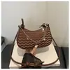 Onda de comércio exterior transfronteiriça texturizada 2026 simples e moderna elegante bolsa de ombro com corrente de bolinho para mulheres